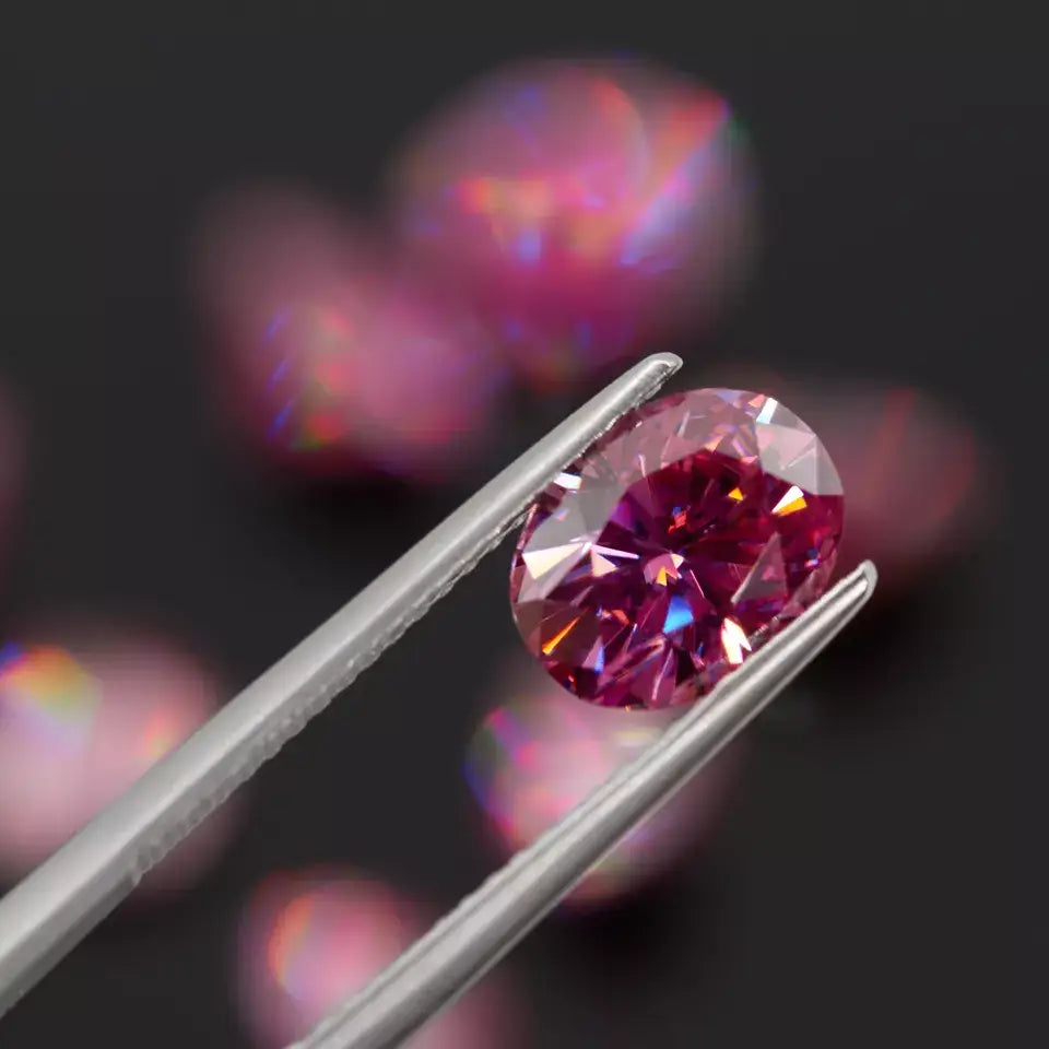 pink oval cut moissanite stone in tweezers, bokeh background with pink stones