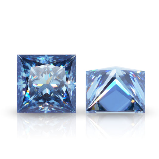 a pair of blue princess cut moissanite stones on white background, brilliant reflections inside