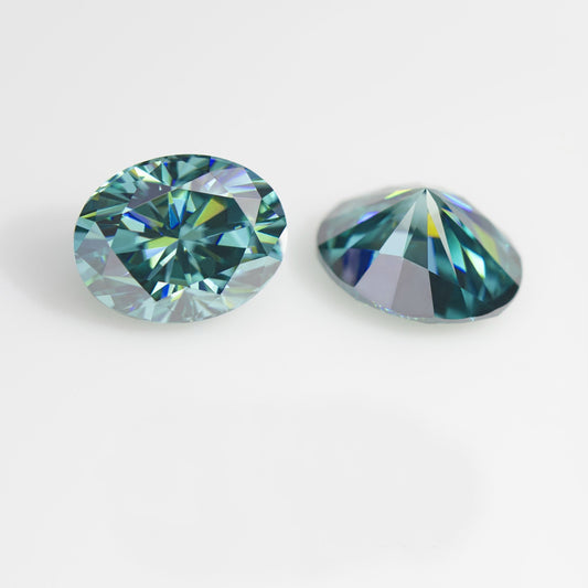 cyan oval cut moissanite stones on off white background, top and bottom view