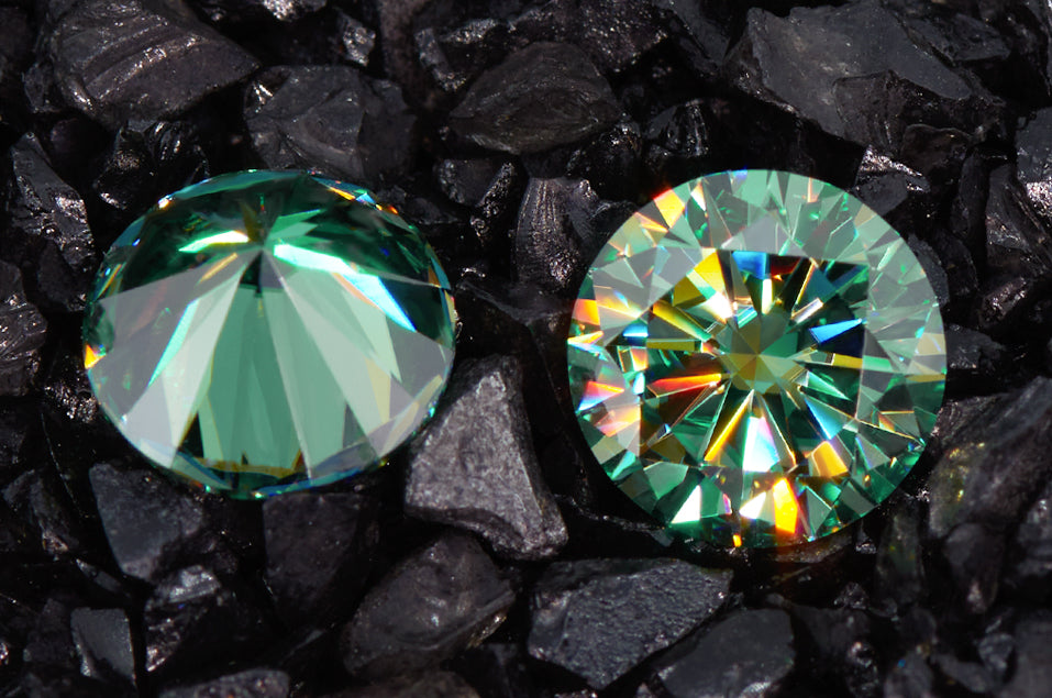 a pair of green round cut moissanite stones on crushed rock background