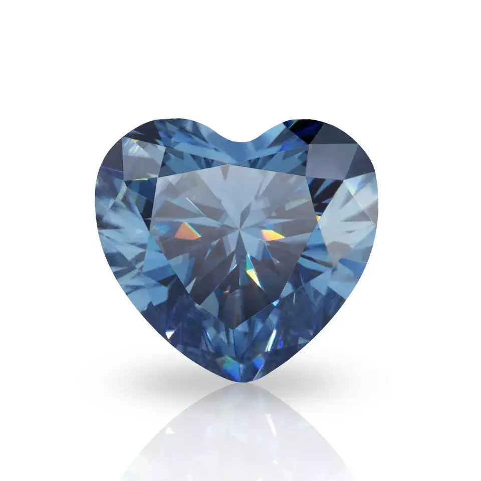 dark blue heart cut moissanite stone on white background, top view