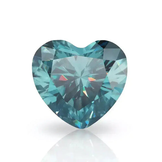 cyan heart cut moissanite stone top view on white background