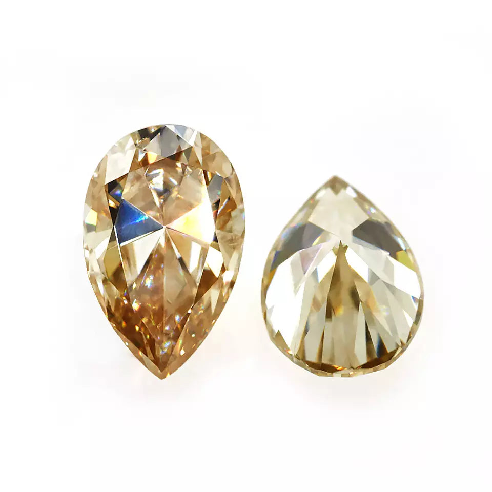 yellow pear cut moissanite stone top and bottom view on white background